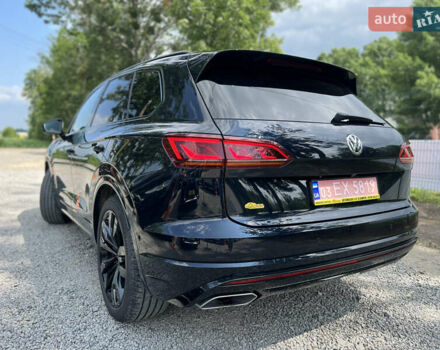 Синій Фольксваген Туарег, об'ємом двигуна 4 л та пробігом 144 тис. км за 52900 $, фото 1 на Automoto.ua