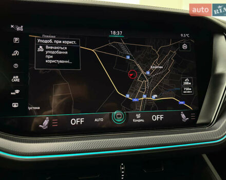 Синій Фольксваген Туарег, об'ємом двигуна 3 л та пробігом 117 тис. км за 52999 $, фото 78 на Automoto.ua