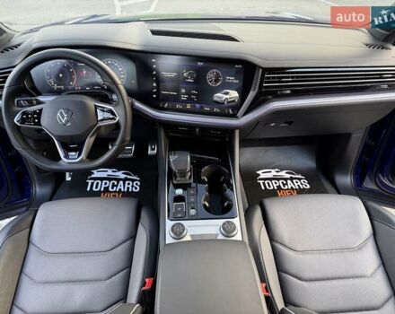 Синий Фольксваген Туарег, объемом двигателя 3 л и пробегом 79 тыс. км за 62500 $, фото 60 на Automoto.ua