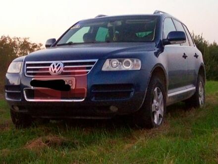 Синий Фольксваген Туарег, объемом двигателя 2.5 л и пробегом 230 тыс. км за 7500 $, фото 1 на Automoto.ua