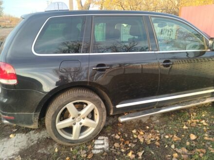 Синий Фольксваген Туарег, объемом двигателя 5 л и пробегом 210 тыс. км за 3783 $, фото 1 на Automoto.ua