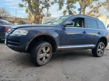 Синий Фольксваген Туарег, объемом двигателя 5 л и пробегом 400 тыс. км за 4662 $, фото 1 на Automoto.ua