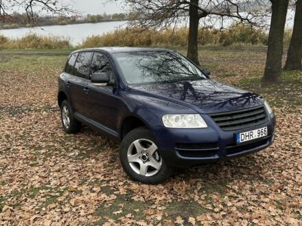 Синий Фольксваген Туарег, объемом двигателя 2.5 л и пробегом 321 тыс. км за 3950 $, фото 1 на Automoto.ua