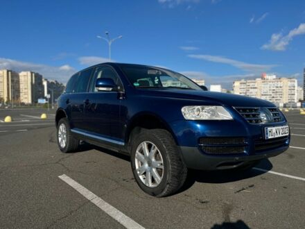 Синий Фольксваген Туарег, объемом двигателя 3 л и пробегом 367 тыс. км за 5800 $, фото 1 на Automoto.ua