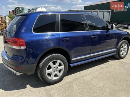 Синий Фольксваген Туарег, объемом двигателя 2.46 л и пробегом 291 тыс. км за 8000 $, фото 1 на Automoto.ua