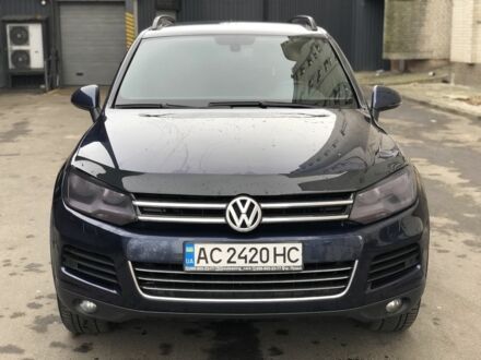 Синій Фольксваген Туарег, об'ємом двигуна 3 л та пробігом 430 тис. км за 15500 $, фото 1 на Automoto.ua