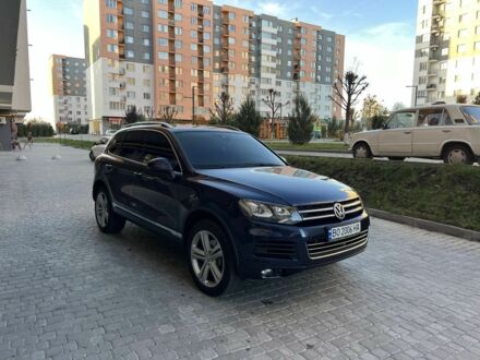 Синій Фольксваген Туарег, об'ємом двигуна 3 л та пробігом 317 тис. км за 18000 $, фото 1 на Automoto.ua