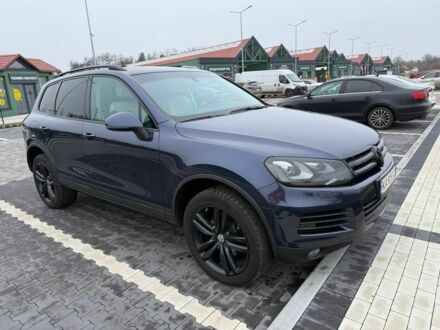 Синий Фольксваген Туарег, объемом двигателя 3 л и пробегом 236 тыс. км за 21500 $, фото 1 на Automoto.ua