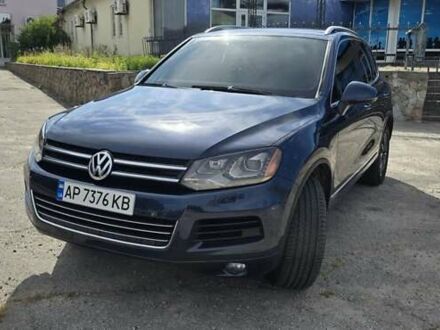 Синий Фольксваген Туарег, объемом двигателя 3 л и пробегом 214 тыс. км за 17900 $, фото 1 на Automoto.ua