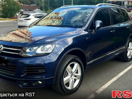 Синий Фольксваген Туарег, объемом двигателя 3 л и пробегом 140 тыс. км за 25000 $, фото 1 на Automoto.ua