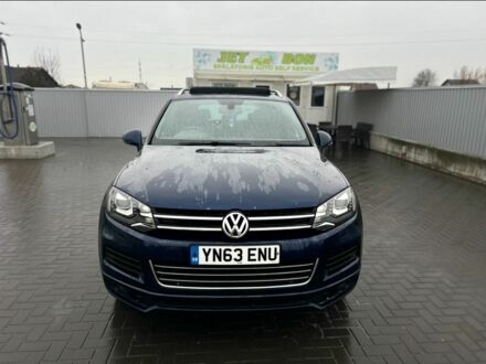 Синий Фольксваген Туарег, объемом двигателя 3 л и пробегом 180 тыс. км за 10744 $, фото 1 на Automoto.ua