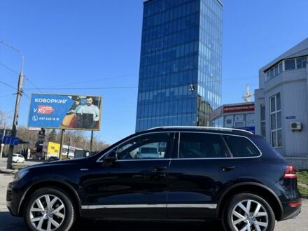 Синій Фольксваген Туарег, об'ємом двигуна 3 л та пробігом 250 тис. км за 18999 $, фото 1 на Automoto.ua