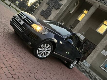 Синий Фольксваген Туарег, объемом двигателя 3 л и пробегом 150 тыс. км за 8595 $, фото 1 на Automoto.ua