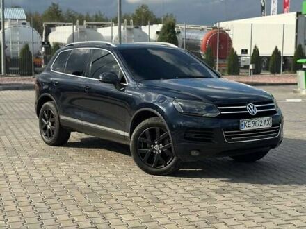 Синий Фольксваген Туарег, объемом двигателя 2.97 л и пробегом 245 тыс. км за 24500 $, фото 1 на Automoto.ua