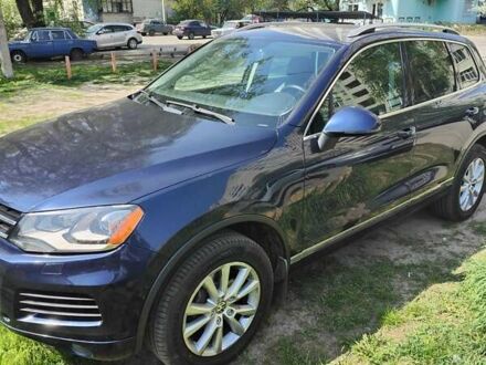 Фольксваген Туарег 2014 в Сумах на Automoto.ua Синий Фольксваген Туарег, объемом двигателя 3.6 л и пробегом 128 тыс. км за 15000 $, фото 1 на Automoto.ua