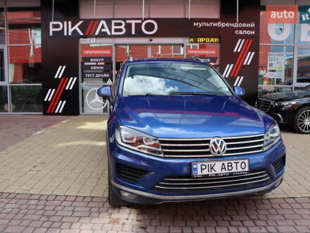 Синий Фольксваген Туарег, объемом двигателя 3 л и пробегом 252 тыс. км за 19900 $, фото 1 на Automoto.ua
