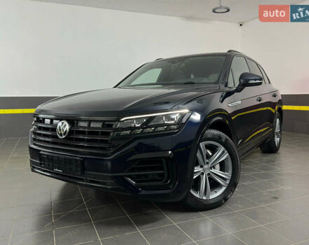 Синій Фольксваген Туарег, об'ємом двигуна 3 л та пробігом 117 тис. км за 52999 $, фото 1 на Automoto.ua