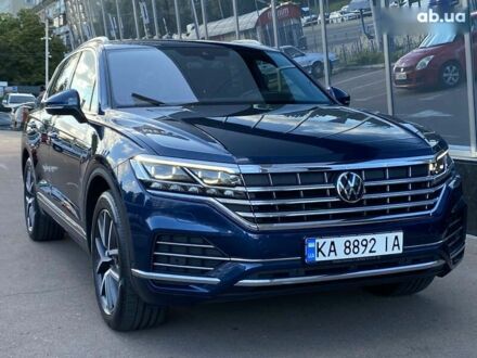 Синий Фольксваген Туарег, объемом двигателя 3 л и пробегом 55 тыс. км за 64900 $, фото 1 на Automoto.ua