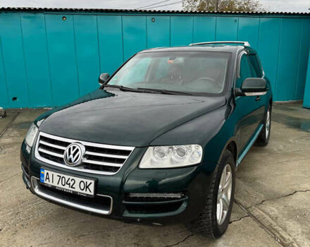 Зеленый Фольксваген Туарег, объемом двигателя 4.92 л и пробегом 201 тыс. км за 6800 $, фото 2 на Automoto.ua