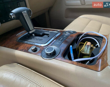 Зелений Фольксваген Туарег, об'ємом двигуна 3 л та пробігом 380 тис. км за 7200 $, фото 24 на Automoto.ua