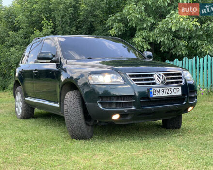 Зелений Фольксваген Туарег, об'ємом двигуна 3 л та пробігом 380 тис. км за 7200 $, фото 1 на Automoto.ua