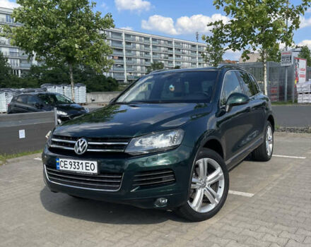 Зеленый Фольксваген Туарег, объемом двигателя 2.97 л и пробегом 279 тыс. км за 22000 $, фото 1 на Automoto.ua