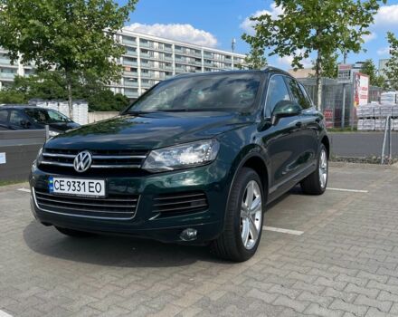 Зелений Фольксваген Туарег, об'ємом двигуна 3 л та пробігом 290 тис. км за 18865 $, фото 14 на Automoto.ua