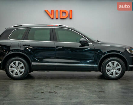 Зеленый Фольксваген Туарег, объемом двигателя 3 л и пробегом 212 тыс. км за 23465 $, фото 5 на Automoto.ua