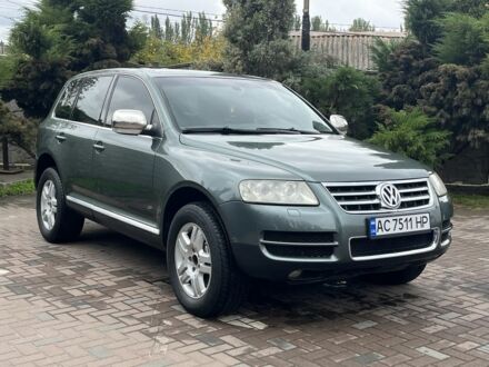 Зеленый Фольксваген Туарег, объемом двигателя 4.9 л и пробегом 280 тыс. км за 5999 $, фото 1 на Automoto.ua