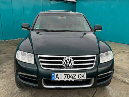 Зеленый Фольксваген Туарег, объемом двигателя 4.92 л и пробегом 201 тыс. км за 6800 $, фото 1 на Automoto.ua