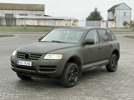 Зеленый Фольксваген Туарег, объемом двигателя 2.5 л и пробегом 370 тыс. км за 3699 $, фото 1 на Automoto.ua