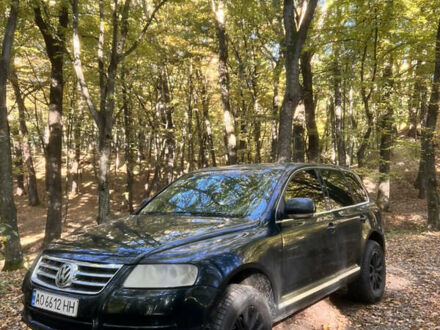 Фольксваген Туарег 2005 в Ужгороде на Automoto.ua Зеленый Фольксваген Туарег, объемом двигателя 2.46 л и пробегом 398 тыс. км за 6500 $, фото 1 на Automoto.ua