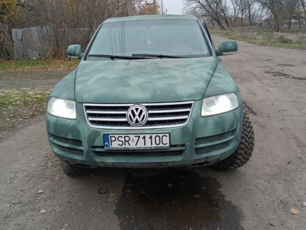 Зеленый Фольксваген Туарег, объемом двигателя 2.5 л и пробегом 300 тыс. км за 5000 $, фото 1 на Automoto.ua