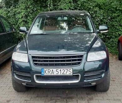 Зелений Фольксваген Туарег, об'ємом двигуна 3 л та пробігом 265 тис. км за 7000 $, фото 1 на Automoto.ua