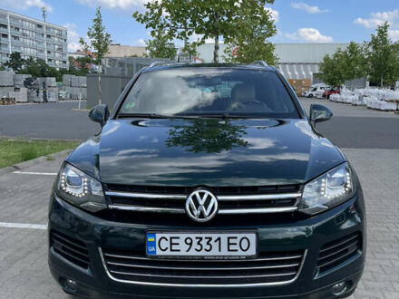 Зеленый Фольксваген Туарег, объемом двигателя 2.97 л и пробегом 279 тыс. км за 22000 $, фото 1 на Automoto.ua