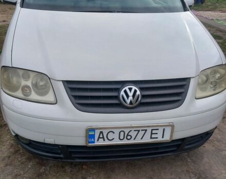 Белый Фольксваген Туран, объемом двигателя 1.9 л и пробегом 350 тыс. км за 4860 $, фото 1 на Automoto.ua
