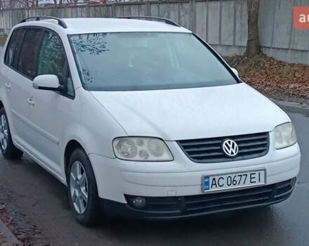 Белый Фольксваген Туран, объемом двигателя 1.9 л и пробегом 376 тыс. км за 4750 $, фото 4 на Automoto.ua
