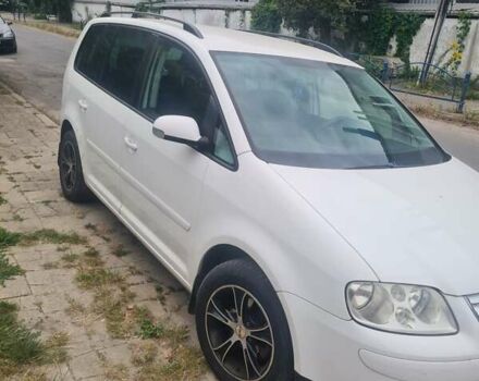 Білий Фольксваген Туран, об'ємом двигуна 1.98 л та пробігом 324 тис. км за 6500 $, фото 1 на Automoto.ua