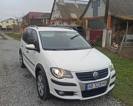 Белый Фольксваген Туран, объемом двигателя 1.4 л и пробегом 208 тыс. км за 8600 $, фото 1 на Automoto.ua