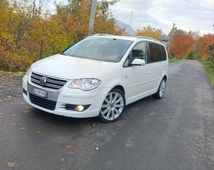 Белый Фольксваген Туран, объемом двигателя 1.4 л и пробегом 182 тыс. км за 8400 $, фото 2 на Automoto.ua