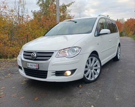 Белый Фольксваген Туран, объемом двигателя 1.4 л и пробегом 182 тыс. км за 8400 $, фото 1 на Automoto.ua
