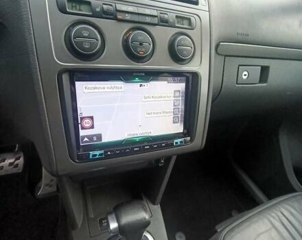 Белый Фольксваген Туран, объемом двигателя 1.4 л и пробегом 182 тыс. км за 8400 $, фото 57 на Automoto.ua