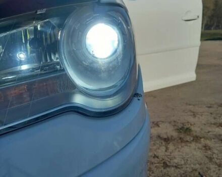 Белый Фольксваген Туран, объемом двигателя 1.39 л и пробегом 316 тыс. км за 8000 $, фото 2 на Automoto.ua