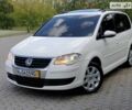 Білий Фольксваген Туран, об'ємом двигуна 1.9 л та пробігом 275 тис. км за 10799 $, фото 1 на Automoto.ua