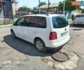 Белый Фольксваген Туран, объемом двигателя 1.4 л и пробегом 250 тыс. км за 7399 $, фото 1 на Automoto.ua