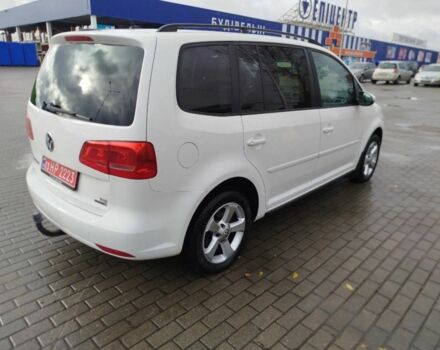 Белый Фольксваген Туран, объемом двигателя 1.4 л и пробегом 238 тыс. км за 8600 $, фото 1 на Automoto.ua