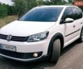 Білий Фольксваген Туран, об'ємом двигуна 2 л та пробігом 230 тис. км за 14000 $, фото 1 на Automoto.ua