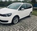 Білий Фольксваген Туран, об'ємом двигуна 1.39 л та пробігом 250 тис. км за 8999 $, фото 1 на Automoto.ua