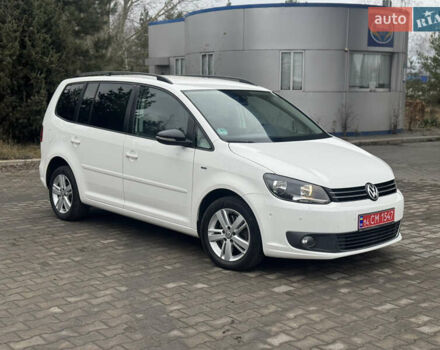 Білий Фольксваген Туран, об'ємом двигуна 2 л та пробігом 251 тис. км за 12300 $, фото 1 на Automoto.ua