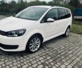 Білий Фольксваген Туран, об'ємом двигуна 1.39 л та пробігом 250 тис. км за 8999 $, фото 1 на Automoto.ua